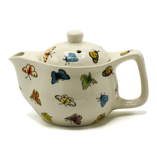 Awaken your senses and embrace the lightness of being with the Small Herbal Teapot – Butterflies by The Witches Garden. This enchanting teapot captures the gentle spirit of transformation and renewal, making each cup of tea a moment of stillness and joy.
Beautifully crafted from high-quality ceramic, it blends elegance with everyday functionality. Inside, a fine metal strainer allows loose-leaf teas and herbal infusions to steep perfectly, drawing out their pure flavours and soothing aromas.
Designed for
