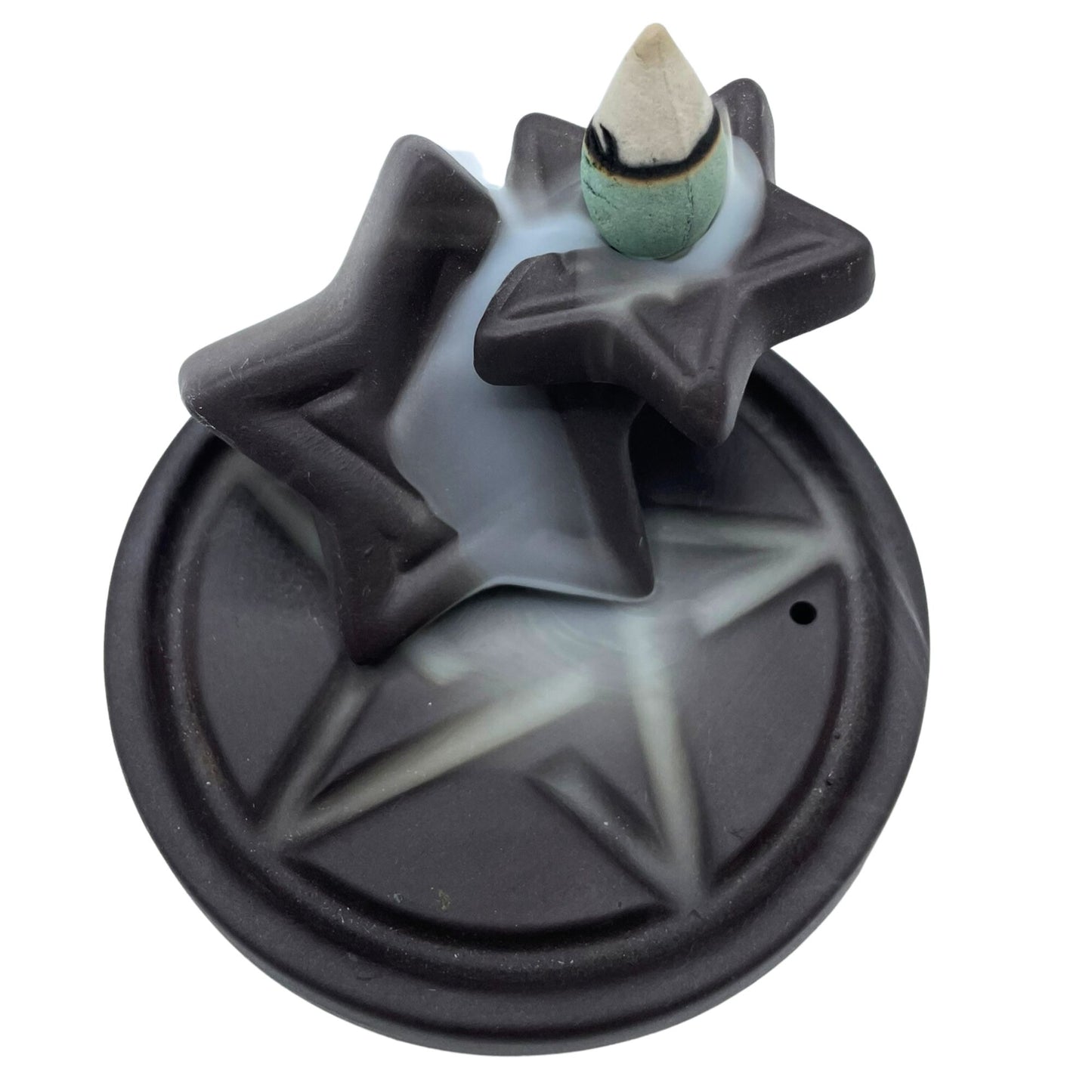 Bring balance and flowing energy into your sacred space with the Pentagon Falls Backflow Incense Burner. Its striking geometric design channels the symbolism of the pentagon—protection, harmony, and the five elements—while the smoke flows downward in a calming waterfall effect.
In spiritual folklore, the pentagon is a sacred shape representing balance between earth, air, fire, water, and spirit. When paired with backflow incense cones, cascading smoke gently falls through the structure like a mystical wate