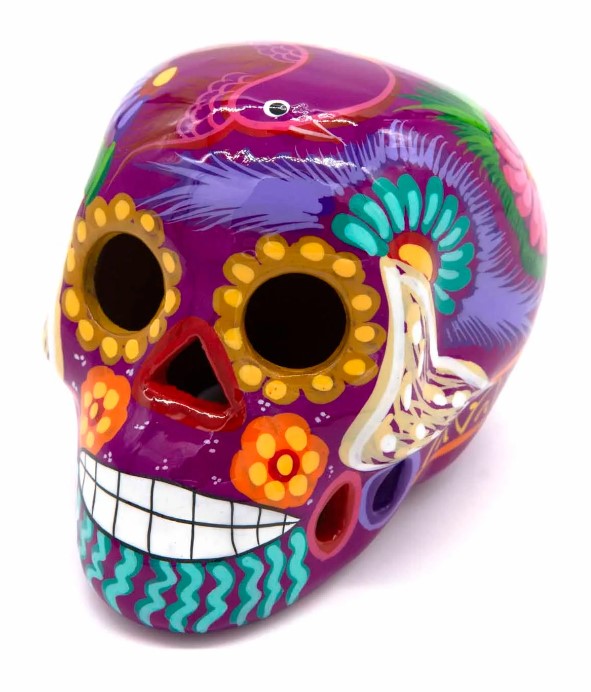 These fun ceramic sugar skull ornaments have been beautifully painted in bright colours and finished with a high shine glaze. They are a popular item during Día de Los Muertos or Day of the Dead festivities, held in Mexico every November to celebrate welcoming the souls of their deceased relatives back for a time of food, drink and celebration.