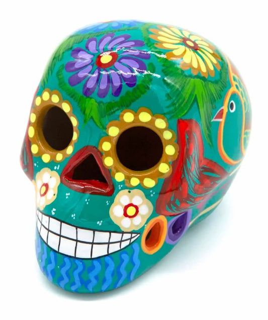 These fun ceramic sugar skull ornaments have been beautifully painted in bright colours and finished with a high shine glaze. They are a popular item during Día de Los Muertos or Day of the Dead festivities, held in Mexico every November to celebrate welcoming the souls of their deceased relatives back for a time of food, drink and celebration.