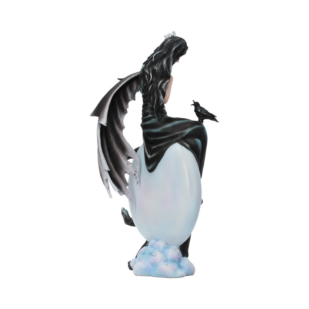 When the veil is thin and the night hangs heavy with secrets, she appears — the Dark Skies fairy, drawn from the bewitching artwork of fantasy artist Nene Thomas. Cloaked in twilight hues, this 28cm figurine embodies the sorrowful beauty of moonlit solitude.
Perched beside her is a raven — silent, watchful, wise — her eternal companion and familiar. Every fold of her gown, every feather of her dark-winged ally, is captured in exquisite detail, cast in fine resin and meticulously hand-painted to honour the