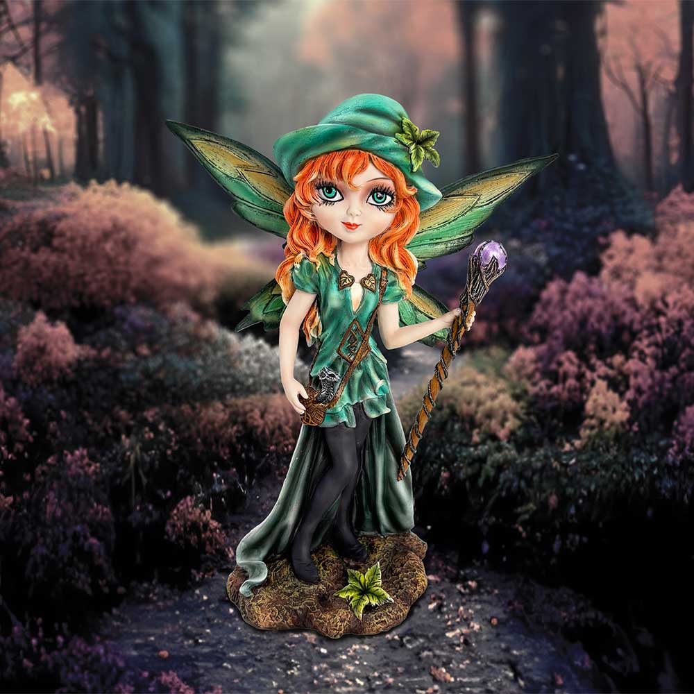 Step softly, dear one, for you tread into enchanted glades where the Forest Fae dwell. This 19cm figurine captures a retro-kawaii fairy spirit, cloaked in woodland wonder. Her luminous green wings whisper secrets of the old forest, while her shimmering purple jewel staff hums with quiet magic.
Nestled snug in her satchel is a baby dragon — her loyal familiar, ever watchful, ever curious. She wears a green leaf-tipped hat, delicate brooches of the forest, and her wide cell-shaded eyes shine with mischief an