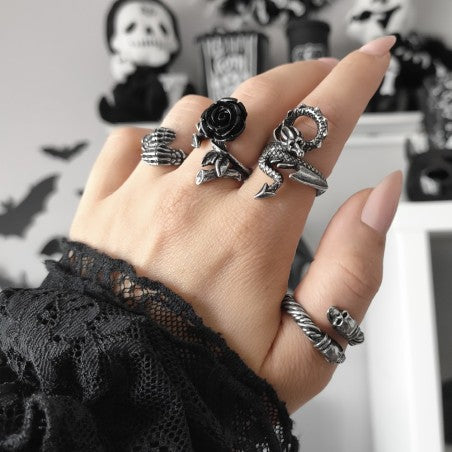 Like a whispering shoulder devil or a witches familiar, this tortuous personal miniature dragon coils itself around your finger.  This unique ring from Alchemy is an eye catching ring, paying homage to the mythical creature that is the dragon.