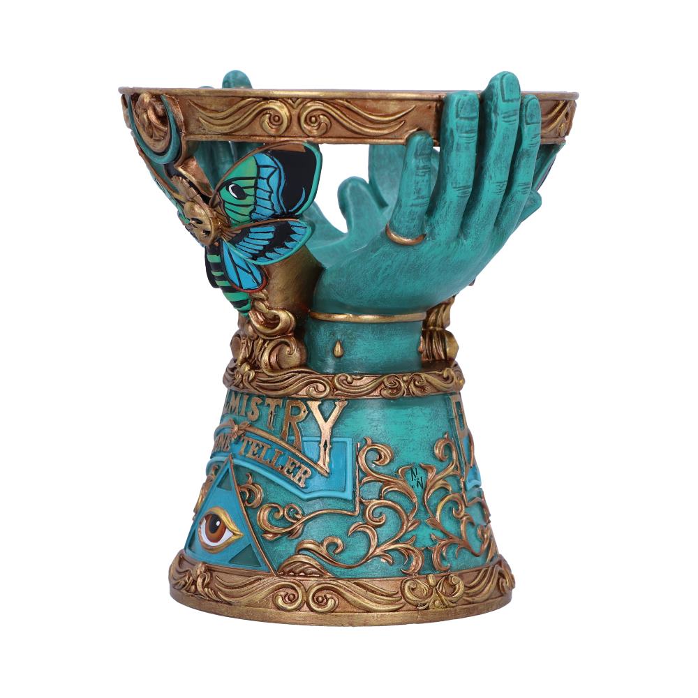 Decorative crystal ball holder with hands holding a bowl, featuring intricate designs and colors on a white background.