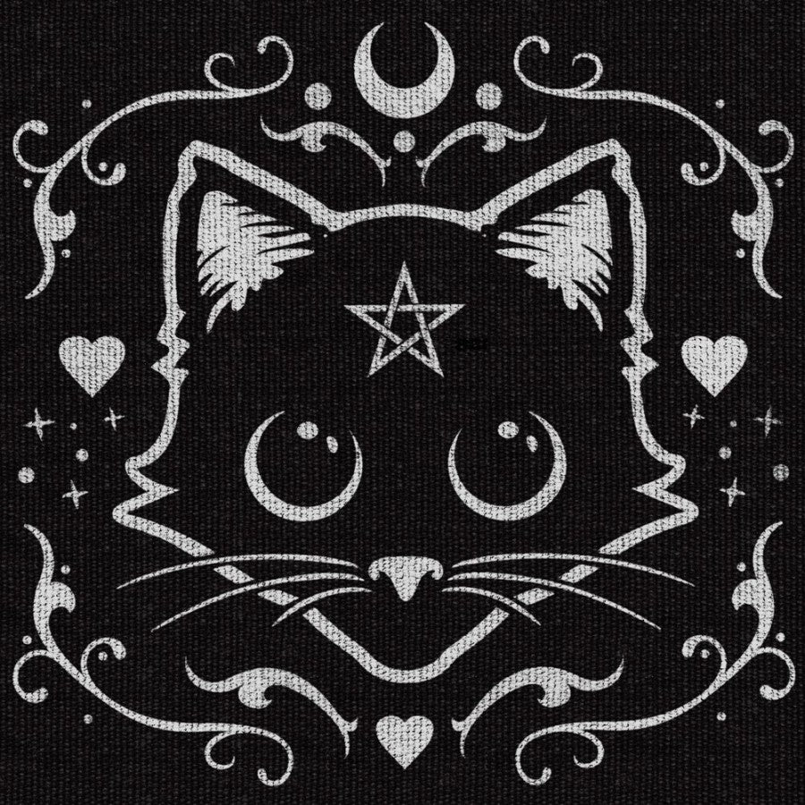 Welcome a familiar spirit into your home.
As any witch worth their potions knows, no hearth or altar is complete without the protective presence of a magical black cat. Now, you can honour your mystical companion with this beautifully handcrafted Alchemy Gothic ‘Purrfect’ Cat Rug.
Featuring an original black cat and magical symbol design from Alchemy, this tasseled, hand-woven rug adds an enchanting touch to any sacred space—whether placed by the fireplace, on the wall, or beneath your spellwork on the alt