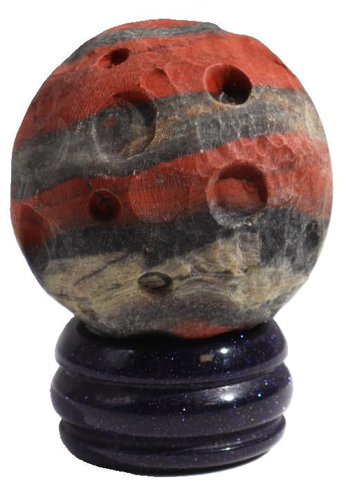 Red Jasper, a stone thrumming with the fiery energy of Mars, ignites the inner warrior. Its bold red hue reflects the planet's association with action and strength. Unlike the calming embrace of Venus, Red Jasper fuels the passion and empowers to conquer any challenge.