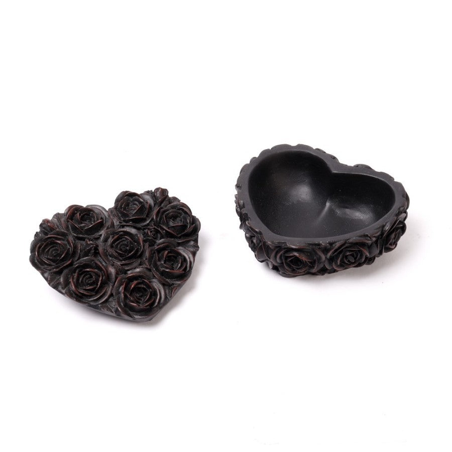Alchemy Gothic – Rose Heart Trinket Box
Unlock the magic of memory with this beautifully sculpted trinket box by Alchemy Gothic. Shaped like a heart and wrapped in delicate rose detailing, this box whispers tales of passion, loss, and sacred secrets.
Its matte black finish adds a moody elegance, perfect for adorning your altar, vanity, or gothic boudoir. Lift the lid to reveal a deep, heart-shaped base – ideal for storing rings, herbs, charms, or treasured keepsakes.
Crafted not just as décor, but as a v