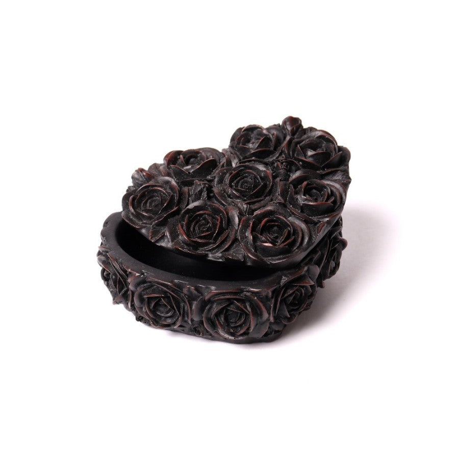 Alchemy Gothic – Rose Heart Trinket Box
Unlock the magic of memory with this beautifully sculpted trinket box by Alchemy Gothic. Shaped like a heart and wrapped in delicate rose detailing, this box whispers tales of passion, loss, and sacred secrets.
Its matte black finish adds a moody elegance, perfect for adorning your altar, vanity, or gothic boudoir. Lift the lid to reveal a deep, heart-shaped base – ideal for storing rings, herbs, charms, or treasured keepsakes.
Crafted not just as décor, but as a v