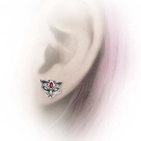A likeness of the Egyptian black cat warrior and protectress, bringer of joy and goddess of sexuality and the moon. A pair of antiqued pewter cat's heads ear studs with small red Austrian elips crystals upon their foreheads.