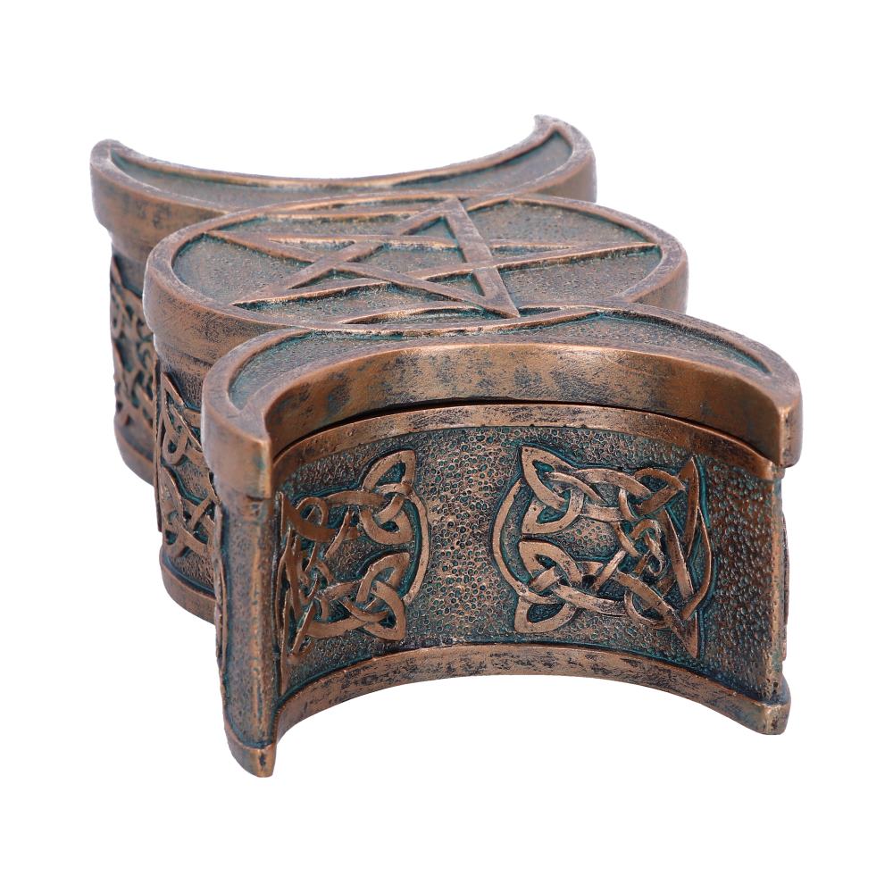 Bronze-colored decorative box with star and Celtic knot designs on a white background