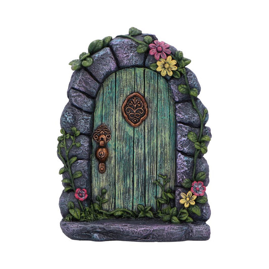 Tread softly, dear wanderer — for you’ve reached the threshold of the fae. The Fae’s Forest Welcome fairy door, standing 16cm tall, invites curious souls to the hidden realms beyond the veil. Nestled within a stone arch, the enchanted green wooden door is adorned with floral brass accents, blooming red and yellow blossoms, and creeping vines that whisper stories of old.
A rustic bronze lock and handle glint beneath the forest light, adding charm and mystery to this magical gateway. Place it at the base of