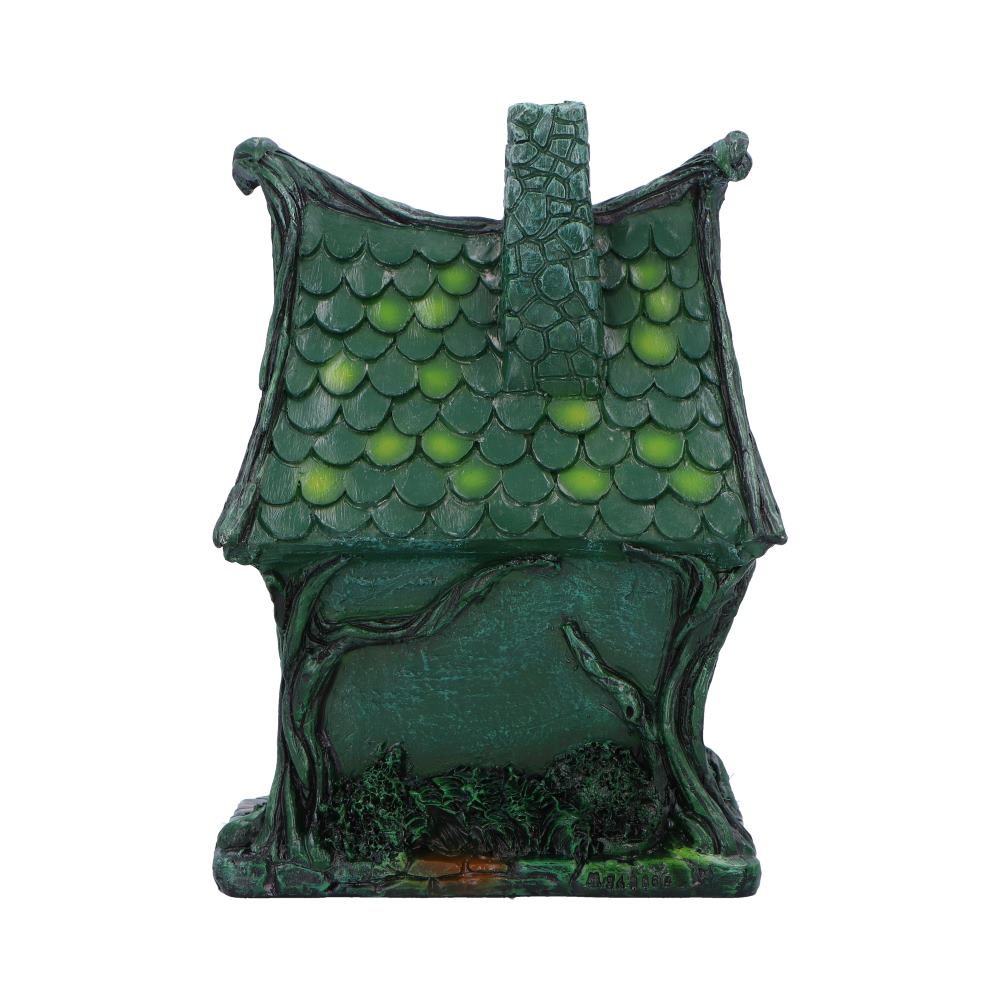 Deep within the shadowed glen lies the Evergreen Lodge — a fairy house aglow with ancient magic. Standing 17cm tall, this gothic-style cottage casts a gentle, mysterious light from within, thanks to its built-in LED illumination that awakens at twilight.
Crafted with care and charm, it features medieval-style arched windows, gnarled tree roots, and delicate s sculpted vines that wind up its stone-like walls. Every crevice whispers of old stories — of hidden folk and moonlit gatherings — making it the perfe