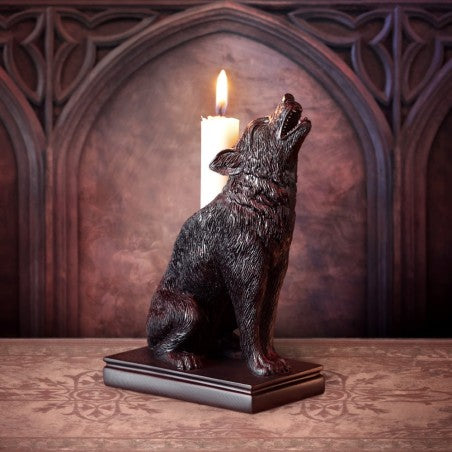 A dark and dramatic candle stick to bestow your dining table, boudoir or altar, this beautifully sculpted Wolf candle stick has been hand finished in the finest quality black resin.
