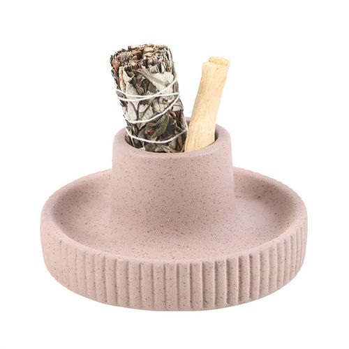 This greige ribbed ceramic smudge bowl is perfect for holding sage or incense. Its ribbed texture adds a contemporary yet timeless touch to any space. Providing a sense of calm and balance, this smudge bowl can be used to enhance spiritual rituals or used as a decorative accent.