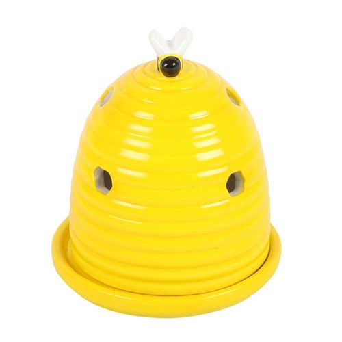 Yellow bee-shaped container with a white stem on a white background