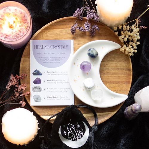 This stunning set of healing crystals comes with four crystal tumblestones to help reduce stress, ease anxiety and promote restful sleep. Includes a crescent moon trinket dish, matching information card and a printed drawstring, making this a meaningful gift for those in need of some extra care.