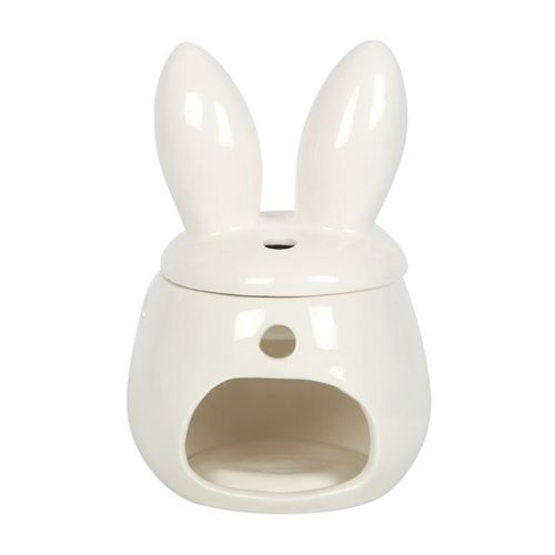 White ceramic oil burner shaped like a rabbit on a white background
