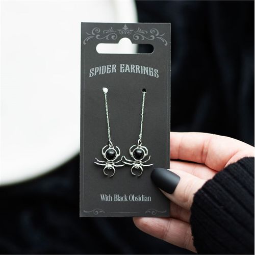 Add a little spooky to your style with these spider earrings crafted from stainless steel and featuring black obsidian details.