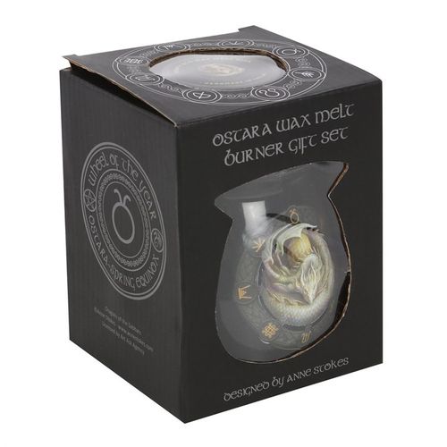 This enchanting gift set includes a beautifully crafted oil burner adorned with the 'Ostara' dragon motif, rendered in vivid, high-quality color. Infused with the warm scent of honey, the wax melts evoke a magical atmosphere. Part of Anne Stokes' 'Dragons of the Sabbat' series, this mystical piece measures 11.5cm tall and 10cm wide and deep, making it a perfect addition to any witch’s sacred space. Packaged thoughtfully at 14.5cm by 11cm by 11cm, it’s ready to inspire and enchant.
