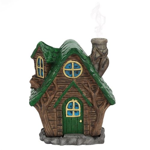 Discover the enchanting 'Woody Lodge' incense cone burner, crafted as a charming miniature house. Light an incense cone inside and see mystical smoke drift from its delicate fairy chimney. Designed by the talented Lisa Parker, this magical piece measures 12cm high, 10cm wide, and 7cm deep, perfect for adding a touch of witchy wonder to your sacred space. Packaged thoughtfully at 16cm by 12cm by 11cm, it’s ready to bring a spellbinding ambiance to your rituals.