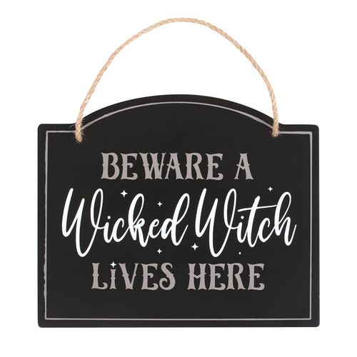 Embrace the enchanting spirit of Halloween with this captivating "Beware A Wicked Witch Lives Here" hanging sign. Crafted to add a touch of mystical charm, its playful warning is accented with magical details that bring a bewitching vibe to any space. Ideal for adorning doors, entryways, or cozy corners, this sign invites all who see it to step into a world of witchy wonder. Whether you're celebrating the season or simply love a hint of the supernatural, this piece is an essential addition to your spellbind