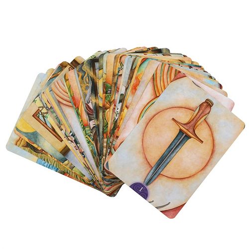 Set of tarot cards with a sword card on top