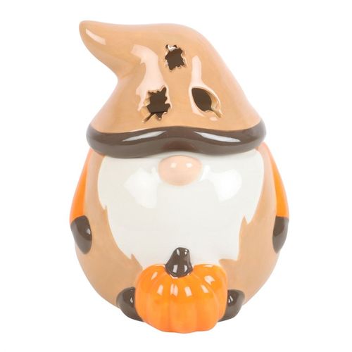 This delightful autumn gonk oil burner will make a unique addition to seasonal decor, capturing the spirit of the season in its warm autumnal tones of orange and brown. With cut-out leaf details in his hat, this oil burner casts an ambient glow perfect for creating cosy nights in. Do not use more than one tealight and remove lid when in use. Recommended for use with fragrance oil diluted with water.