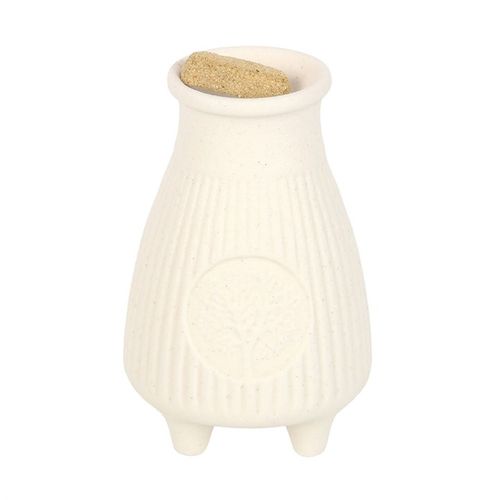 This cream ribbed ceramic Palo Santo Brick burner is perfect for safely holding and burning Palo Santo incense bricks. Its ribbed texture adds a contemporary yet timeless touch to any space. Cleansing and purifying negative energies, this burner can be used to enhance spiritual rituals or used as a decorative accent.