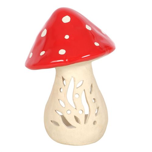 This delightful ceramic mushroom tealight holder brings a cozy, enchanted glow to any room. More than just a candle holder, it weaves a spell of woodland charm and fairy-tale mystery, perfect for infusing your space with a touch of magical cottagecore allure.