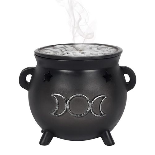 Set an incense cone within this resin cauldron adorned with the triple moon symbol, and witness the smoke softly swirl upwards. Featuring star-shaped cutouts and a weathered silver triple moon motif, it includes a detachable lid resembling a bubbling potion. Dimensions: H8cm x W10cm x D9cm; Packaged: H9.5cm x W9cm x D9cm.