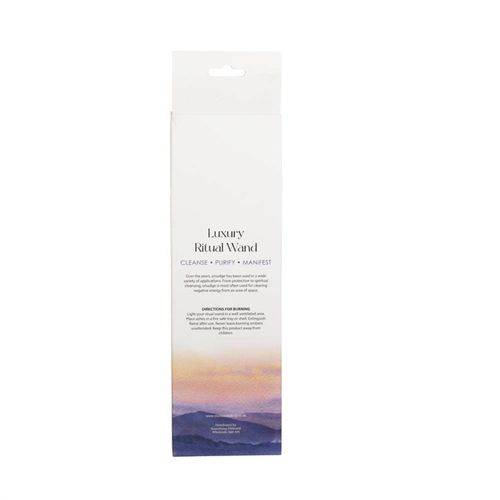 Package of a luxury ritual wand with a scenic design on a white background