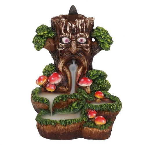 Discover the enchanting Tree Man Backflow Incense Burner, where vibrant details bring magic to your space. Light a backflow cone and watch as the smoke gracefully flows downward like a mystical waterfall, gathering at the base in a captivating dance. Ideal for indoor use, away from drafts, this burner leaves a gentle oily sheen after use—simply wipe clean to maintain its charm. Remember, only backflow cones reveal its full spellbinding effect, which begins about 10 minutes after lighting. Dimensions: H15.5c