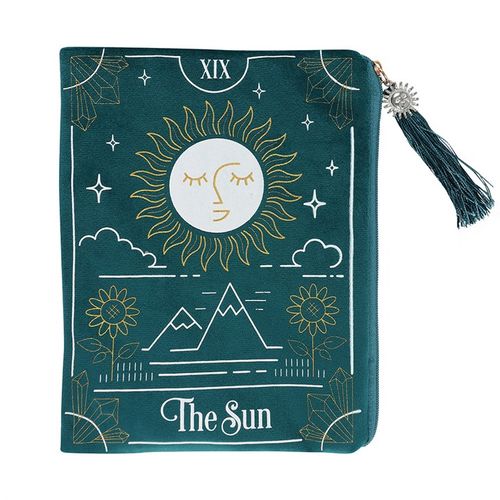 This velvet zipper pouch is the perfect place to keep tarot decks, crystals, beauty products and other treasures. Features a stunning white and gold sun tarot card illustration on the front and a matching tassel and gold sun charm on the zipper.