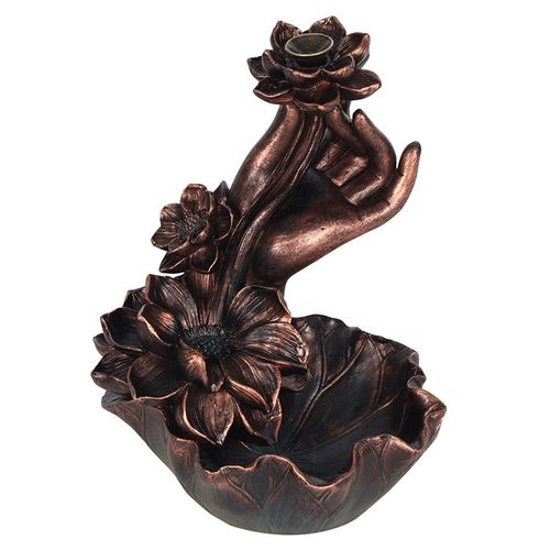 Bronze hand holding flowers with a candle holder on a white background