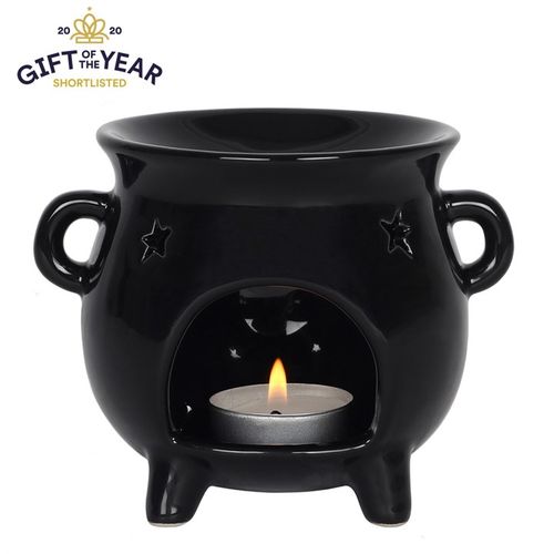 Black cauldron oil burner with cut out star detail, the perfect item for anyone with an interest in witchcraft or wizardry. Use with fragrance oil or wax melts. Product Dimensions: H10cm x W13.5cm x D10cm Packaged Dimensions: H12.5cm x W13.5cm x D12cm