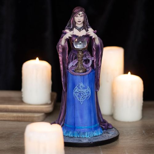 This exquisite dragon figurine, crafted with exquisite detail, embodies the enchanting connection between a seer and her dragon guardian. Renowned fantasy artist Anne Stokes infuses her signature imaginative style into this captivating creation. The dragon coils protectively around the crystal ball, symbolizing deep trust and mystical unity. Ideal for lovers of fantasy, collectors, and those drawn to the magic of otherworldly realms.
