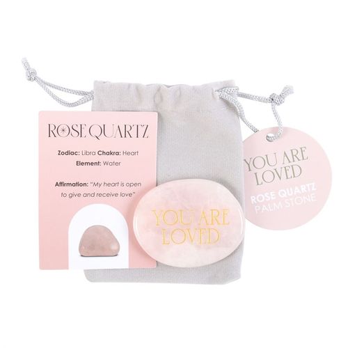 This rose quartz palm stone, etched with golden "you are loved" lettering, serves as a powerful emblem of affection and nurturing energy. Infused with the stone’s gentle, healing vibrations, it radiates compassion and warmth. Accompanied by a mystical guide card and a protective drawstring pouch, this enchanted talisman is a treasured offering of heartfelt devotion.