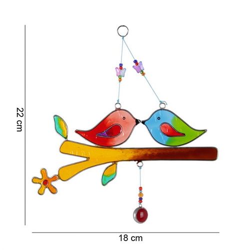 Delight in the enchanting glow of this lovebird suncatcher, crafted from shimmering glass and sturdy metal. Perfect for both your sacred indoor space or a sunlit outdoor altar, it captures light and weaves it into a magical dance. Let it hang where the sun’s rays touch, illuminating your surroundings with mystical charm. Dimensions: H22cm x W21.5cm x D0.7cm. Packaged: H10cm x W23cm x D1cm.