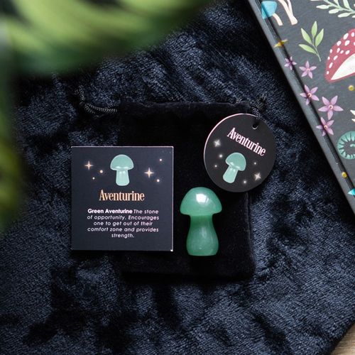 Harness the power of crystal healing with this Magical Crystal Mushroom crafted from polished aventurine. This beautiful stone promotes strength and bravery, making it a powerful tool for overcoming difficult tasks.