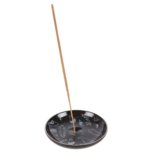 Ideal for those who cherish crystals and embrace witchcraft, this stylish black incense plate showcases enchanting motifs of crystals, witch hats, and potions. Crafted to hold both incense sticks and cones, it includes a central hole for sticks and a steady flat area for cones. A magical accent that enhances any space with a bewitching vibe.