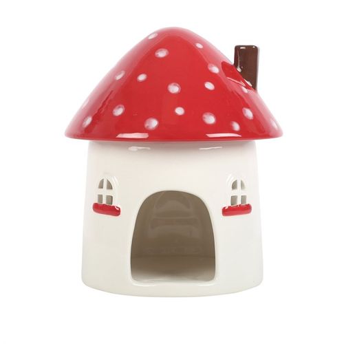Bring fairy-tale magic and gentle healing energy into your sacred space with this Whimsical Mushroom House Oil Burner. Handcrafted with love and perfect for winter rituals, this toadstool-shaped treasure isn't just a decor piece – it's a portal to tranquillity.
Add a few drops of your favourite essential oil or a calming wax melt under the charming mushroom cap, and let the warmth of a single tealight release peaceful, aromatic vibes into your home. The windows softly glow when lit, infusing your space wit