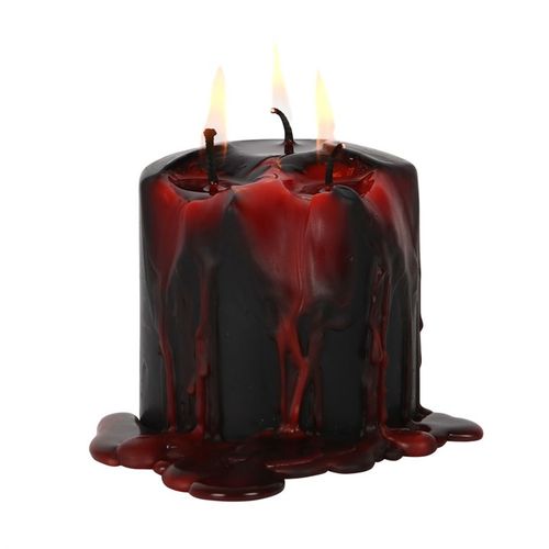 This small Vampire Blood pillar candle casts a spell with its mesmerizing bleeding wax that drips down its sides, perfect for enchanting dinners or setting a mysterious ambiance. Set it upon a decorative pedestal to amplify its magical allure. Crafted from unscented paraffin wax, it offers around three hours of flickering, otherworldly glow. Remember to shield your surfaces and never leave the flame unattended. Dimensions: 7.6cm tall and wide, a compact charm for your mystical space.