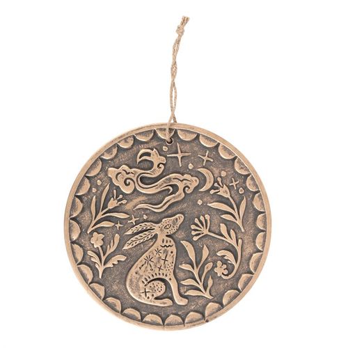 This mystical terracotta wall plaque features a graceful, moon gazing hare in a bronze finish. The hare is a symbol of regeneration, fertility, and magic in many ancient cultures, making it a charming gift for hare and wildlife enthusiasts. Includes a rope attached to easily hang on walls or displayed on shelves.