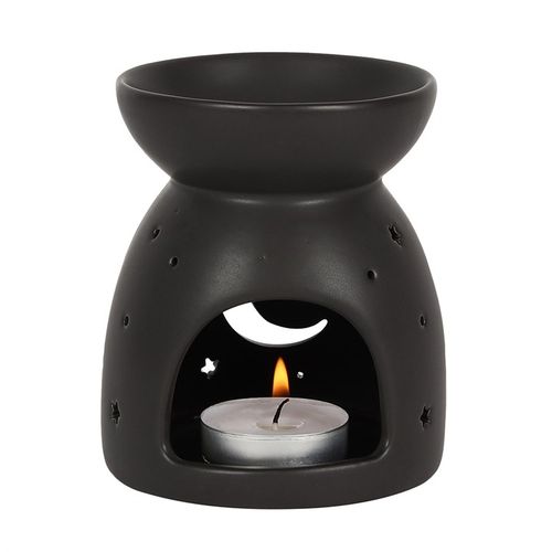 Embrace the magic of the night with this black ceramic oil burner, adorned with an enchanting crescent moon and star cutout. Crafted with a soothing matt finish, it’s perfect for channeling calm energies and elevating your spiritual space. Ideal for burning your favorite fragrance oils or wax melts, this burner releases mystical aromas that enhance meditation, rituals, or simply create a serene atmosphere. Its compact size (H10.5cm x W9.5cm x D9.5cm) makes it a perfect fit for altars, sacred corners, or Hal