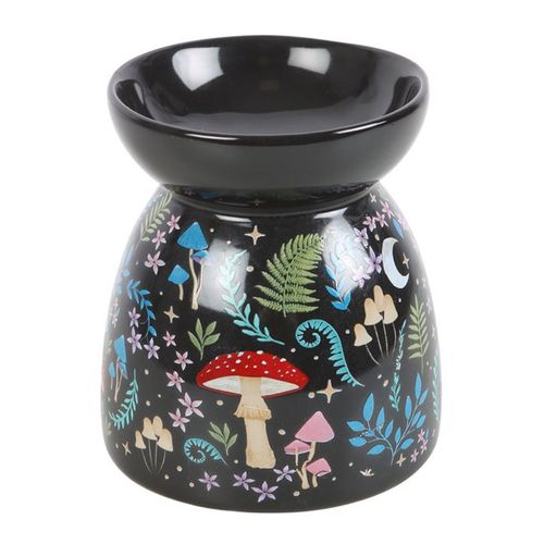 Black ceramic oil burner with fairy tale design on a white background