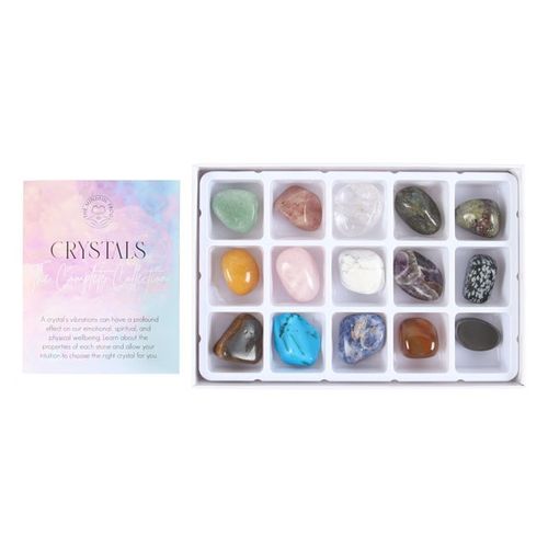 Crystals include green aventurine, strawberry quartz, clear quartz, labradorite, dragon bloodsone, yellow aventurine, rose quartz, white howlite, chevron amethyst, snowflake obsidian, gold tiger's eye, blue turquenite, sodalite, carnelian, and hematite packaged in a sliding gift box.