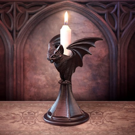 A beautifully sculpted Bat candle stick, hand finished in the finest quality black resin. This dark and dramatic candle stick will stunningly bestow your dining table, boudoir or altar
