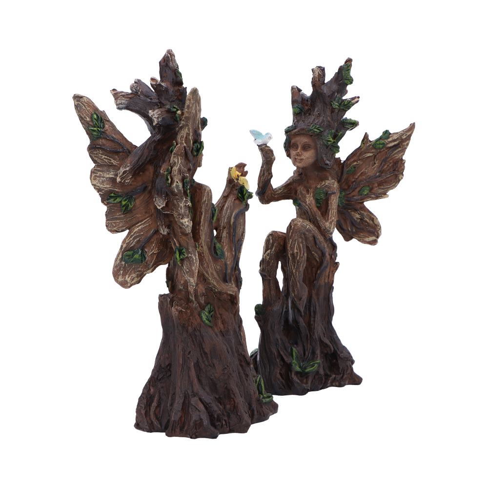 Tree-like fairy figurine with detailed wings and foliage on a white background