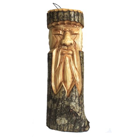 Invite the ancient spirits into your sacred space with this Tree Trunk Carving of the Man of the Wood, a powerful symbol of wisdom, strength, and connection to the natural world. Hand-carved from offcuts of Chinaberry (Jempinis) and Hibiscus trunks, each piece is a unique embodiment of Earth’s enduring magic.

Standing 50cm tall, this rustic guardian is ideal for adorning your garden, patio, or conservatory. Whether placed beside a grove, nestled within your herb patch, or watching over your home altar, he 