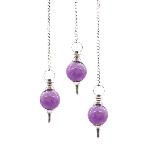 From the sacred depths of Mother Earth, this Amethyst Sphere Pendulum calls to those who seek wisdom and spiritual clarity. Each pendulum is lovingly handmade, a unique talisman forged by nature’s own hands. The amethyst stone, known as the stone of the divine healer, brings peace to the restless mind, opens the third eye, and shields your spirit from negativity. Swing this pendulum to reveal hidden truths, to guide your intuitive path, or to cleanse your energy field.

The chain, approximately 170mm in len